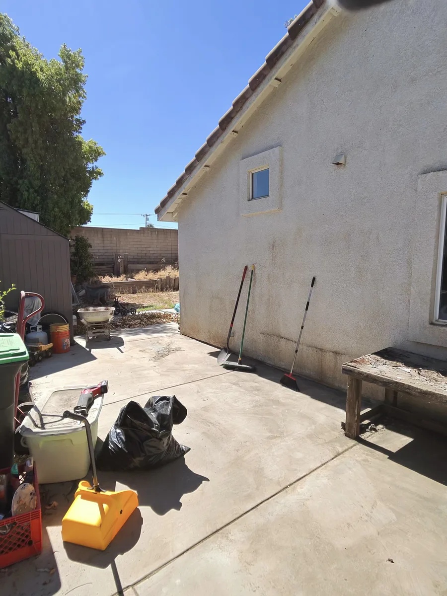 The same Lake Elsinore side yard swept clean after 1775 Junk Hauling hauled the debris away